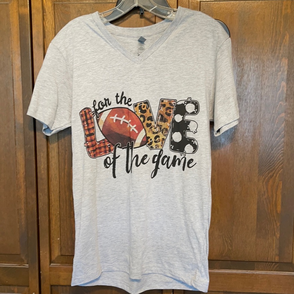 Super cute like new football T-shirt